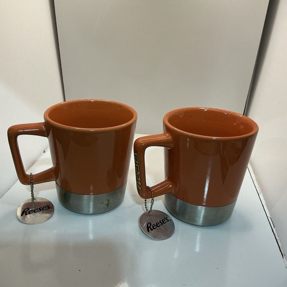 Reese’s Set of 2 Orange Coffee Mugs Silver Tone Base Jaxxi Hershey’s Vintage